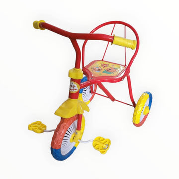 Colorful children's tricycle on a white background